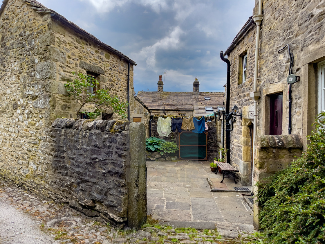 "Grassington, Cottage Yard, Washing. Yorkshire Dales." by Peter W. Clark - 'photographer' - £12.00 "Grassington, Cottage Yard, Washing. Yorkshire Dales." stock image