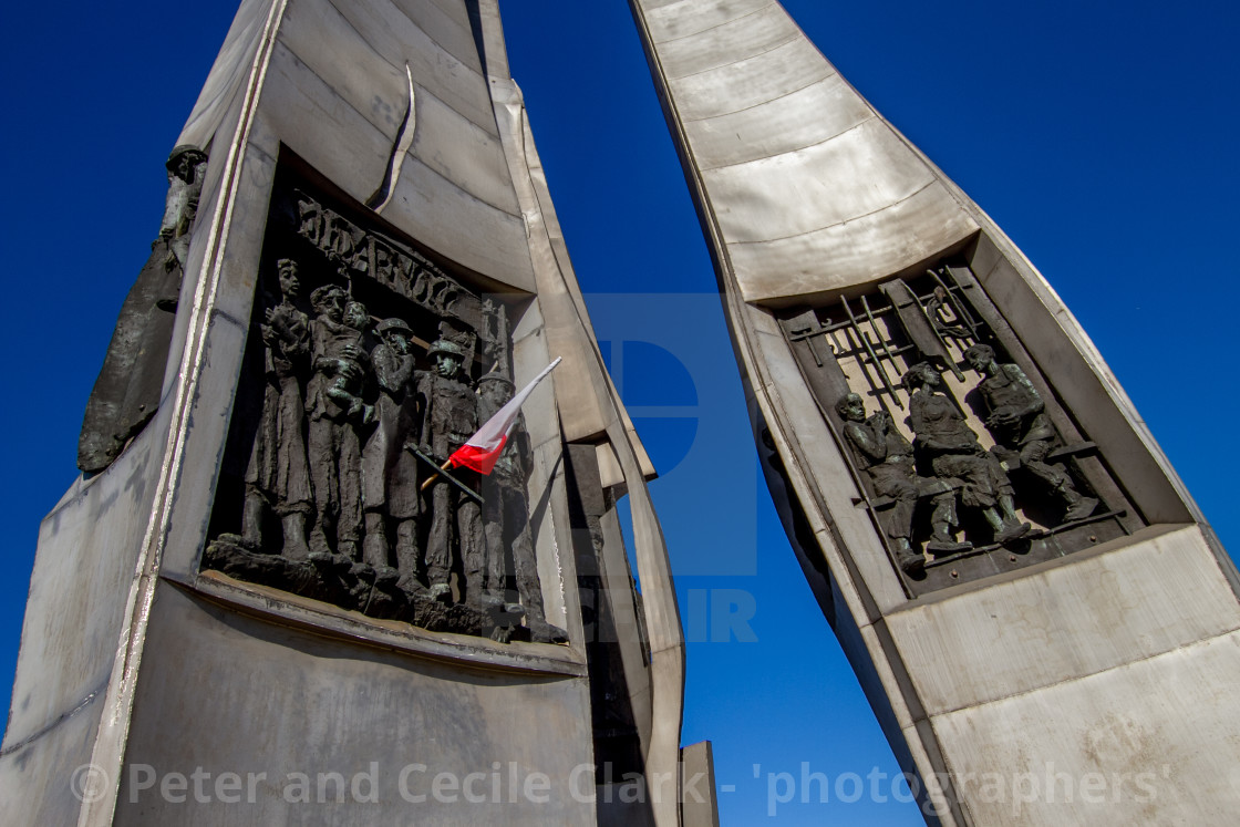 "Monument to the Fallen Shipyard Workers of 1970 Gdansk, Poland with Flag" stock image