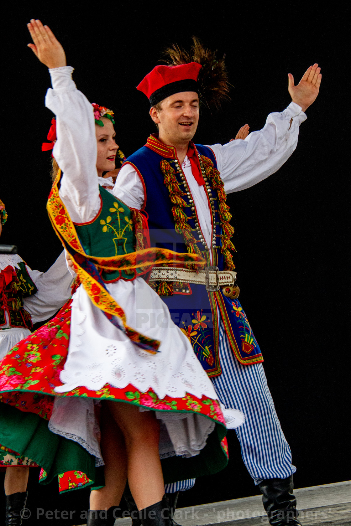 "Couple in Traditional Dress Dancing at the International Festival of Children and Youth Folk Groups. Krakow" stock image