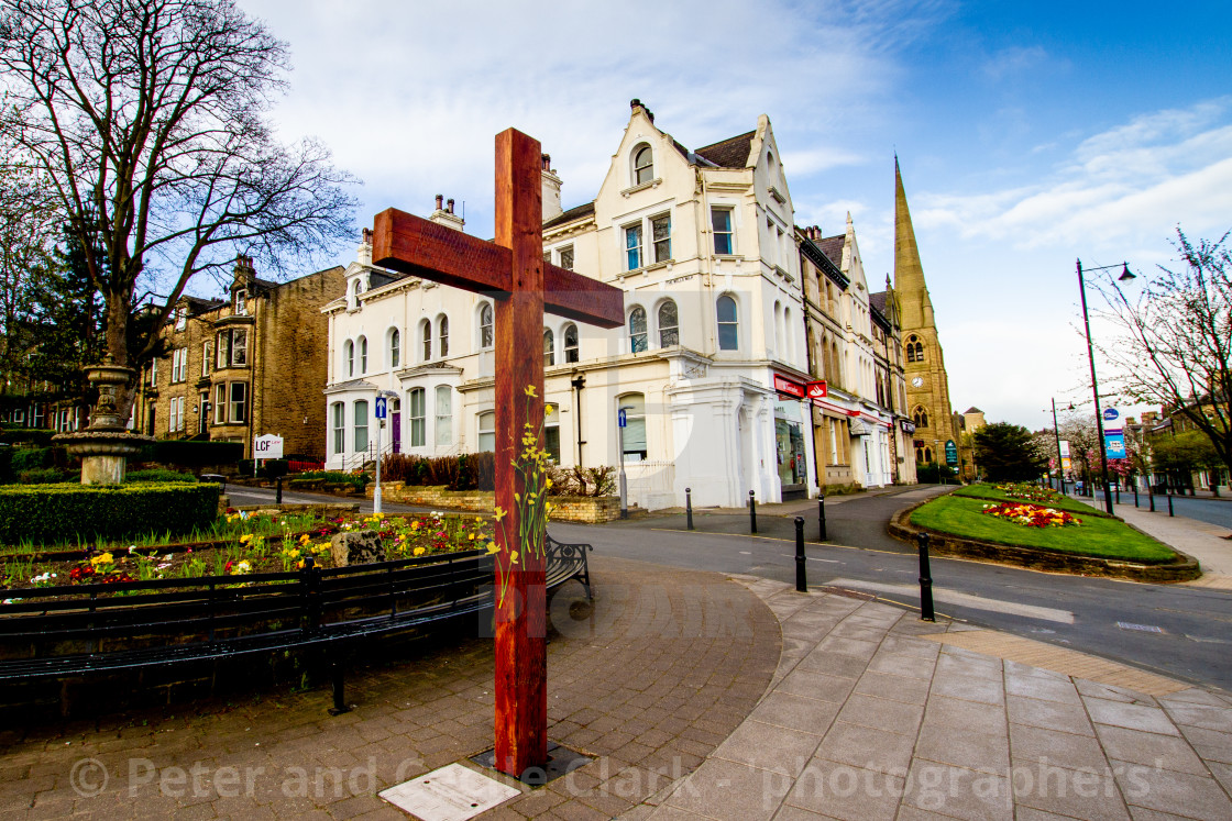 "Easter Cross with Daffodils, Ilkley" stock image