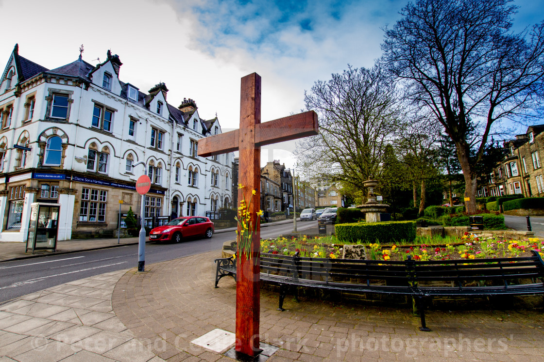 "Easter Cross with Daffodils, Ilkley" stock image