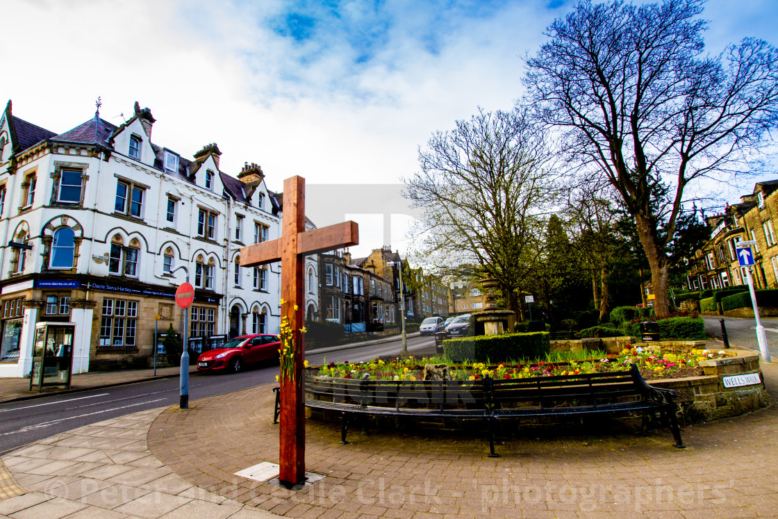 "Easter Cross with Daffodils, Ilkley" stock image