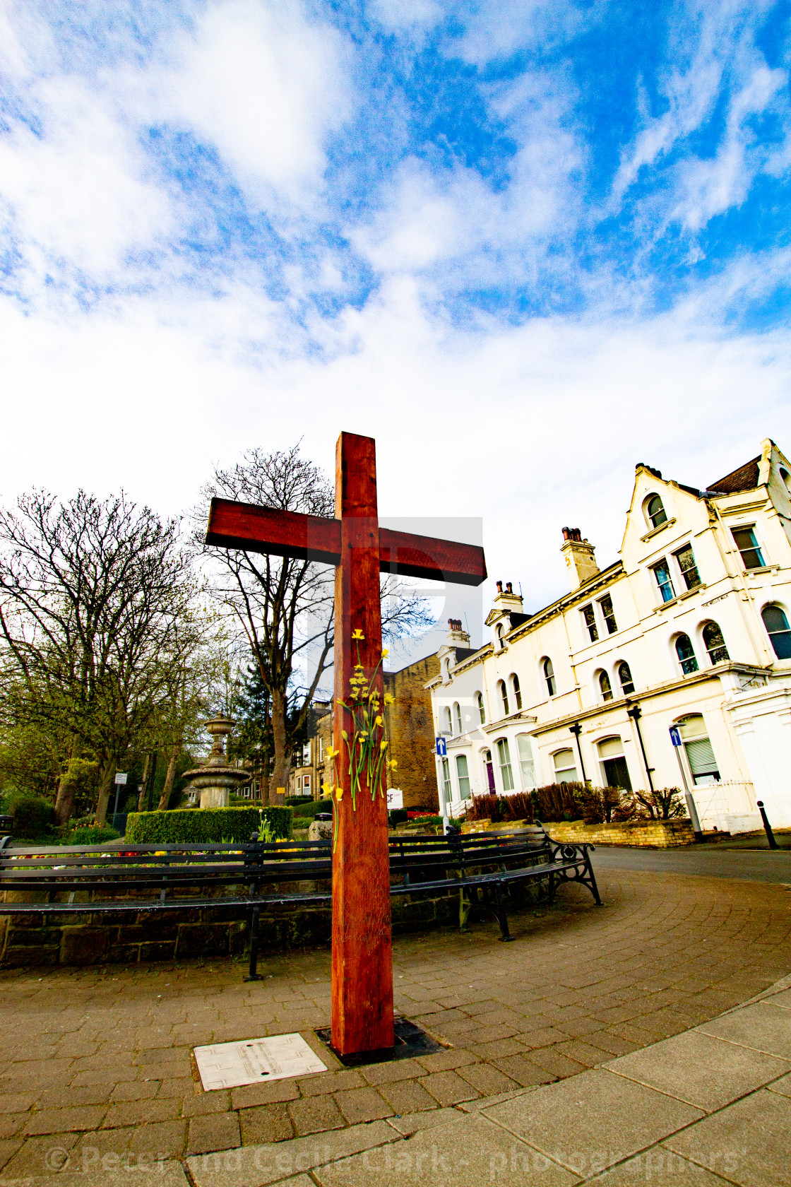 "Easter Cross with Daffodils, Ilkley" stock image