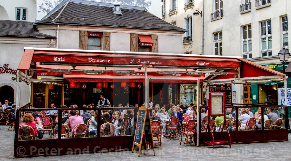 "Vibrant Pavement Cafe in Paris" stock image