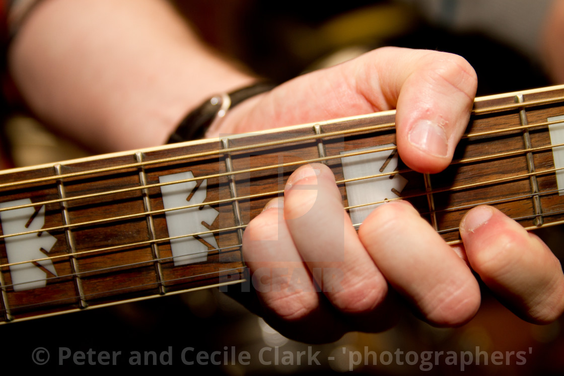 "Guitar, finger placing for a chord" stock image