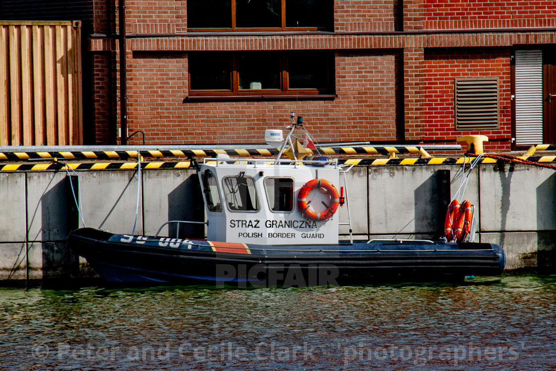 "Swinoujscie, Photographs of a Polish Seaport.. Polish Border Guard Boat" by Peter and Cecile Clark - 'photographers' - $25.27 "Swinoujscie, Photographs of a Polish Seaport.. Polish Border Guard Boat" stock image