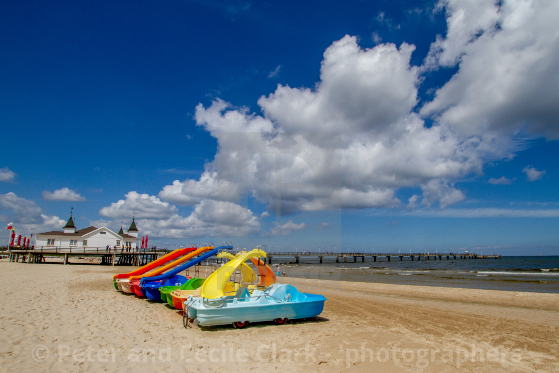 "Photographs of Ahlbeck a Seaside Resort on the Baltic Sea Coast, Germany. The Beach on a Sunny Day. Pedal Boats with Water Slides to Foreground." stock image