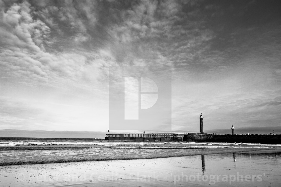 "Whitby, UK, Beach, Pier,lighthouse and Reflection. Monochrome and Copy Space." stock image