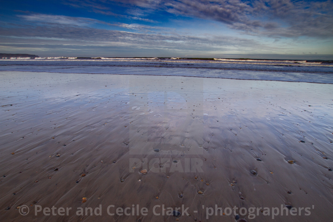 "Whitby, UK, Beach, Reflection. Blue Sky and Copy Space." stock image