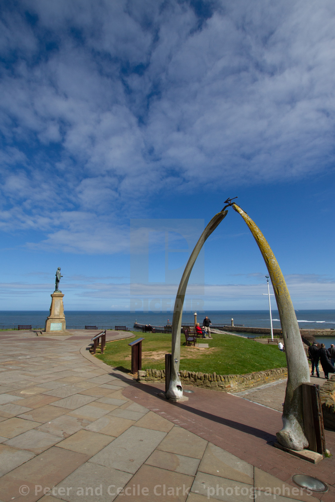 "Whitby,UK,Yorkshire,East coast, Monuments, Captain Cook Statue and the Whalebone Arch." stock image