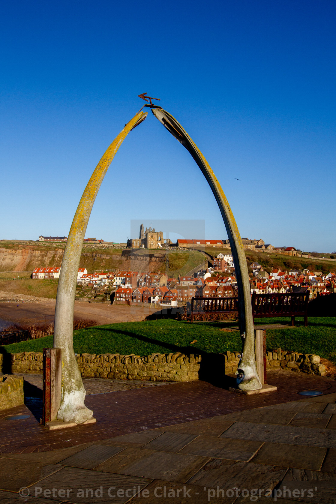 "Whitby,UK,Yorkshire,East coast, Monuments, the Whalebone Arch. Whitby Abbey in the background." stock image