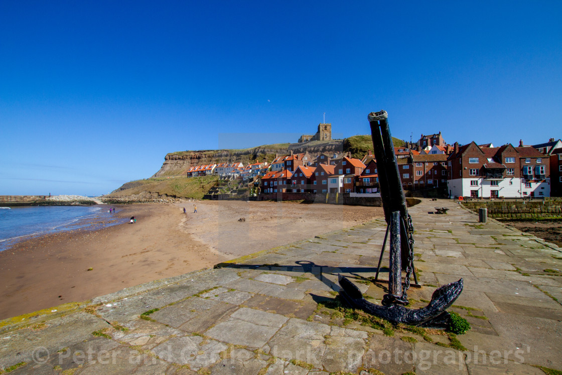 "Whitby,UK,Yorkshire,East coast, Old Anchor on Tate Hill Pier. St Mary's Church in the Background." stock image