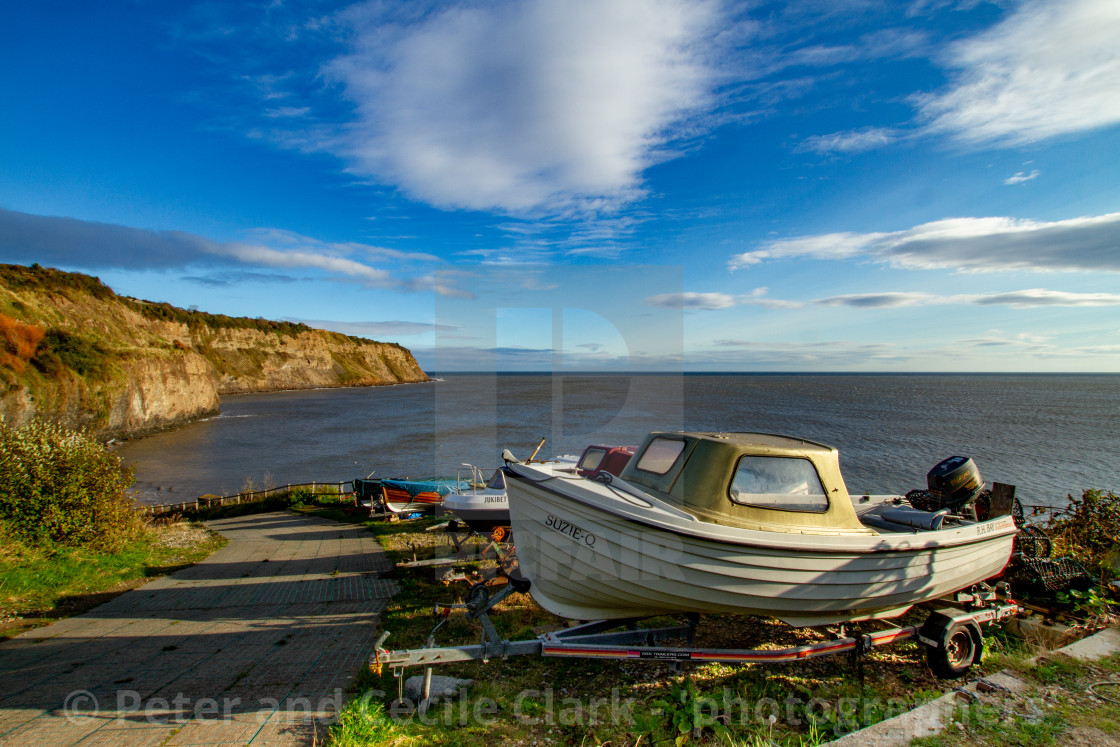 "Small Fishing Boats on Trailers Parked Overlooking Robin Hoods Bay, Yorkshire." stock image