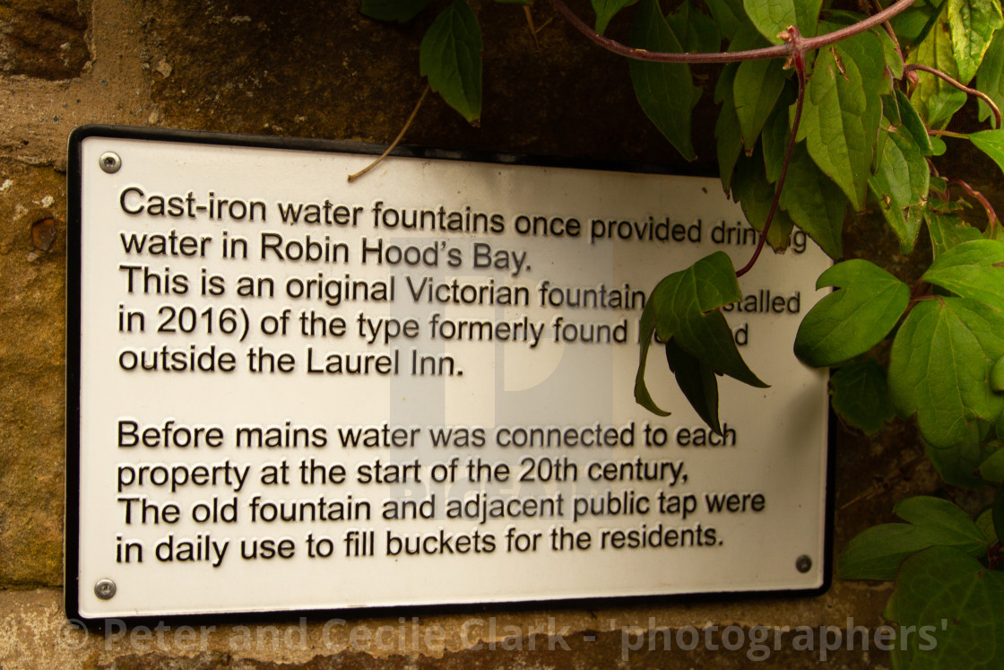 "Information Plaque, Cast Iron Water Fountain, Robin Hoods Bay, Yorkshire." stock image