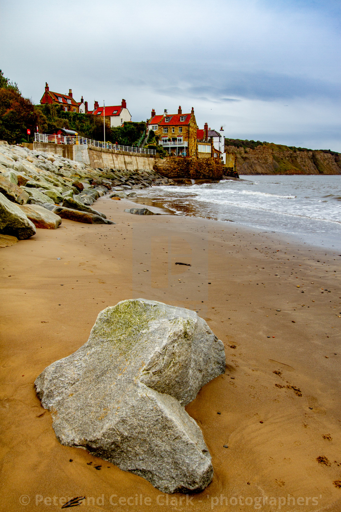 "Robin Hoods Bay, Sea Defences and Beach." stock image