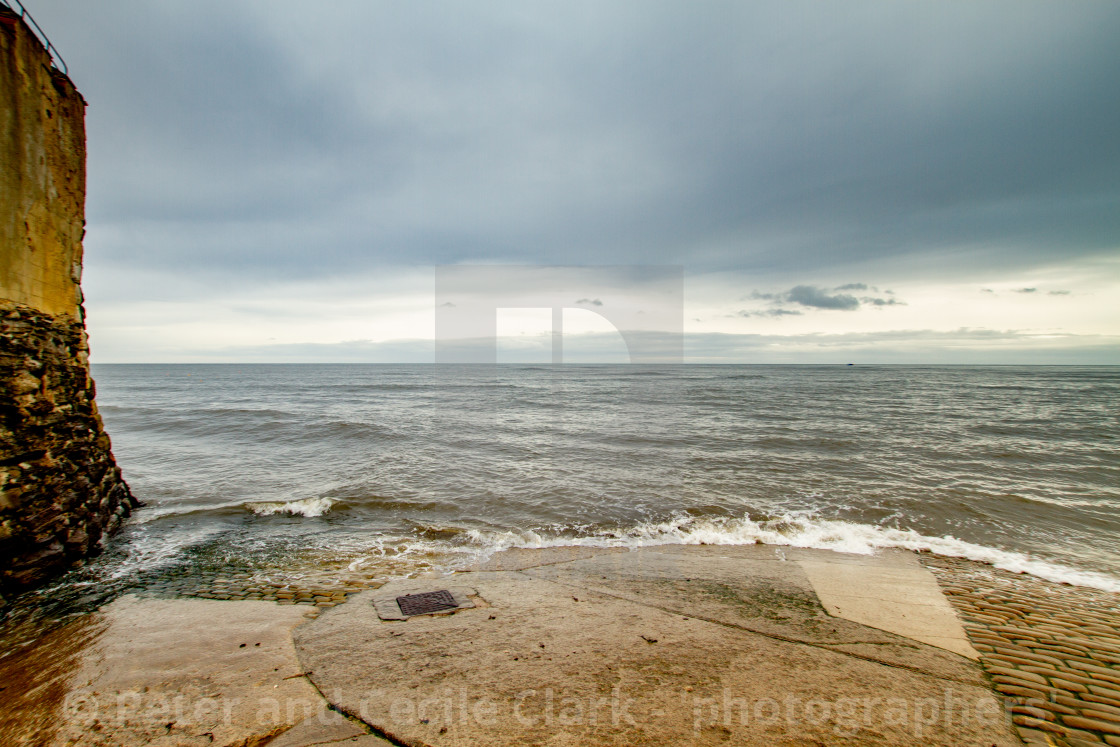 "Robin Hoods Bay, Shimmering Sea View from The Slipway Landing" stock image