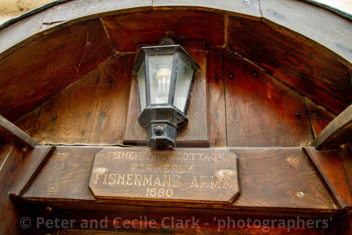 "Arched Entrance to Fishermans Cottage, Robin Hoods Bay, Yorkshire East Coast. Formerly Fishermans Arms 1680 an old Tavern." stock image