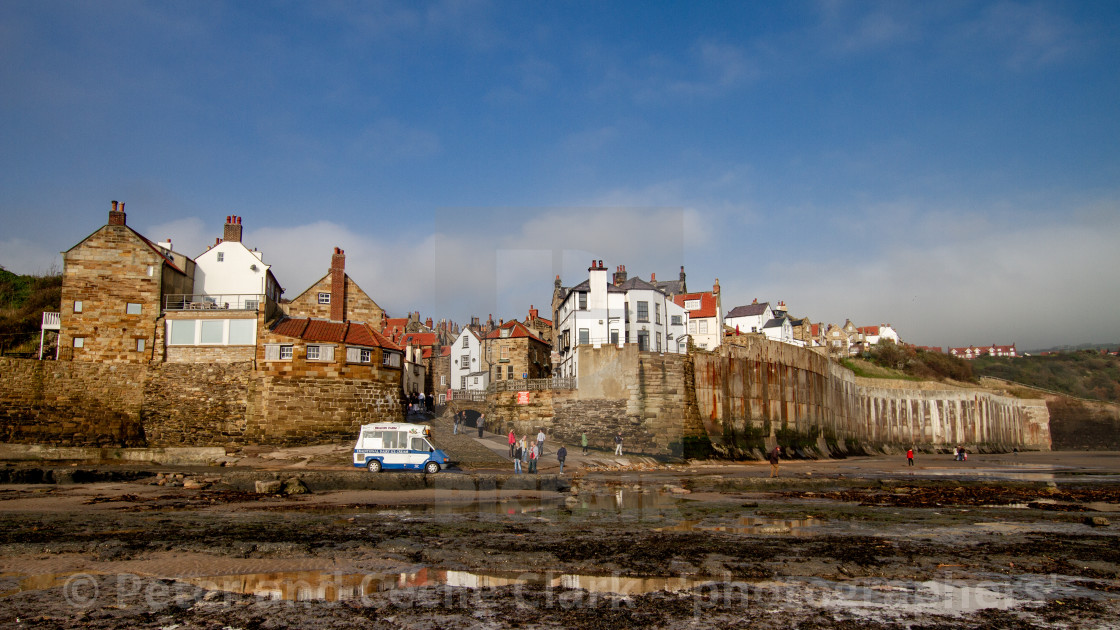 "Robin Hoods Bay, Yorkshire East Coast, England. A Panoramic View from the Beach with Ice Cream Van to the Foreground. Photographed 10th October 2010" stock image