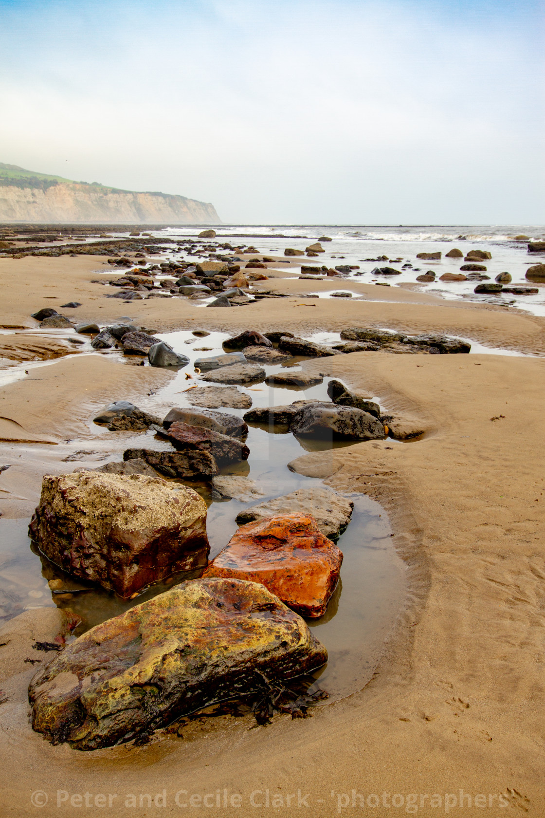 "Rockpools and Beach at Robin Hoods Bay, Yorkshire East Coast, England. A Panoramic View from the Beach" stock image