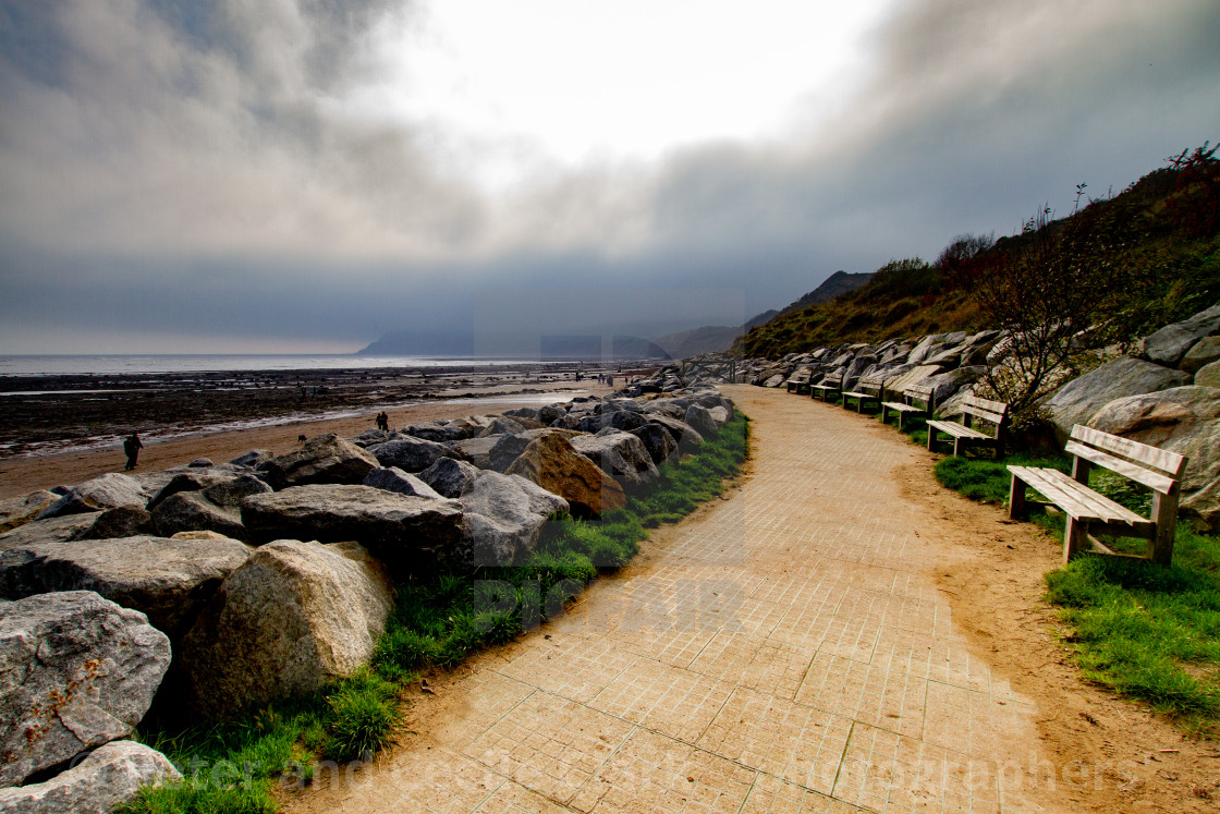 "Promenade, Walk next to Rock Sea Defences at Robin Hoods Bay, Yorkshire East Coast, England." stock image