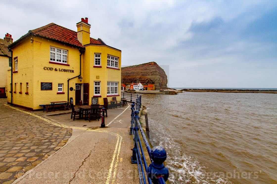 "Cod and Lobster Pub next to the harbour, Staithes, East Yorkshire Coast, England." stock image