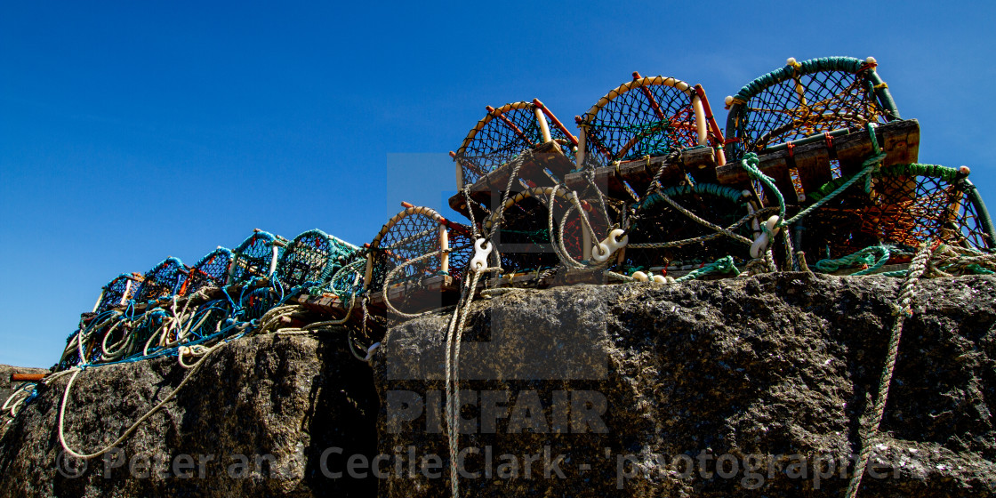 "Lobster Pots at Staithes Harbour Wall, Yorkshire East Coast, England." stock image