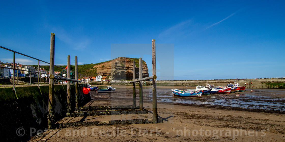 "Staithes and Cowbar Nab, Fishing Boats to the Foreground. Yorkshire Coast, England." stock image