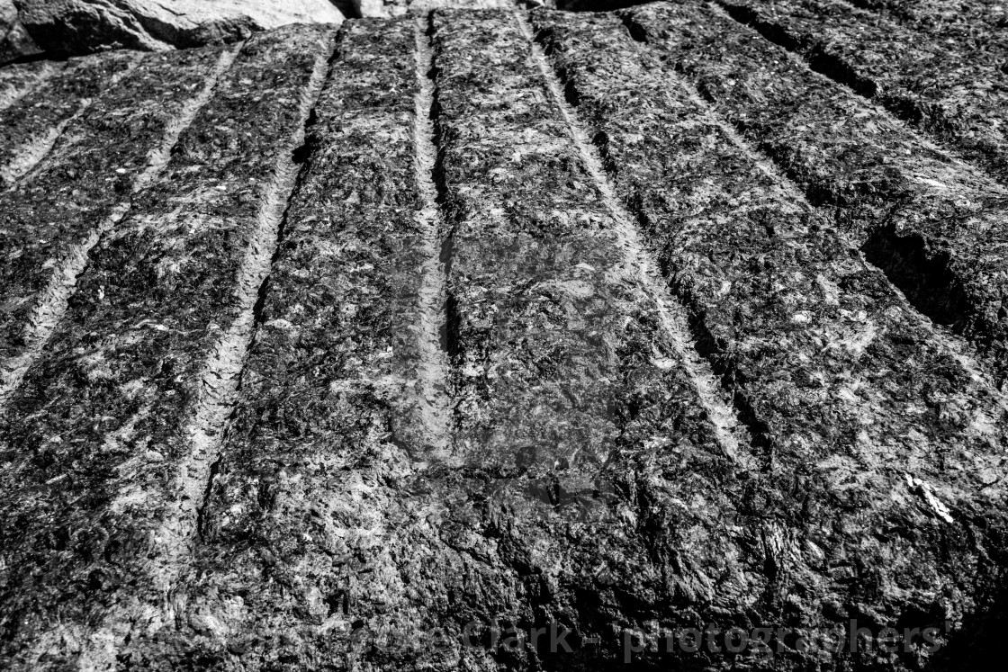 "Staithes Harbour Wall Stone Detail, Yorkshire, England. (monochrome)" stock image