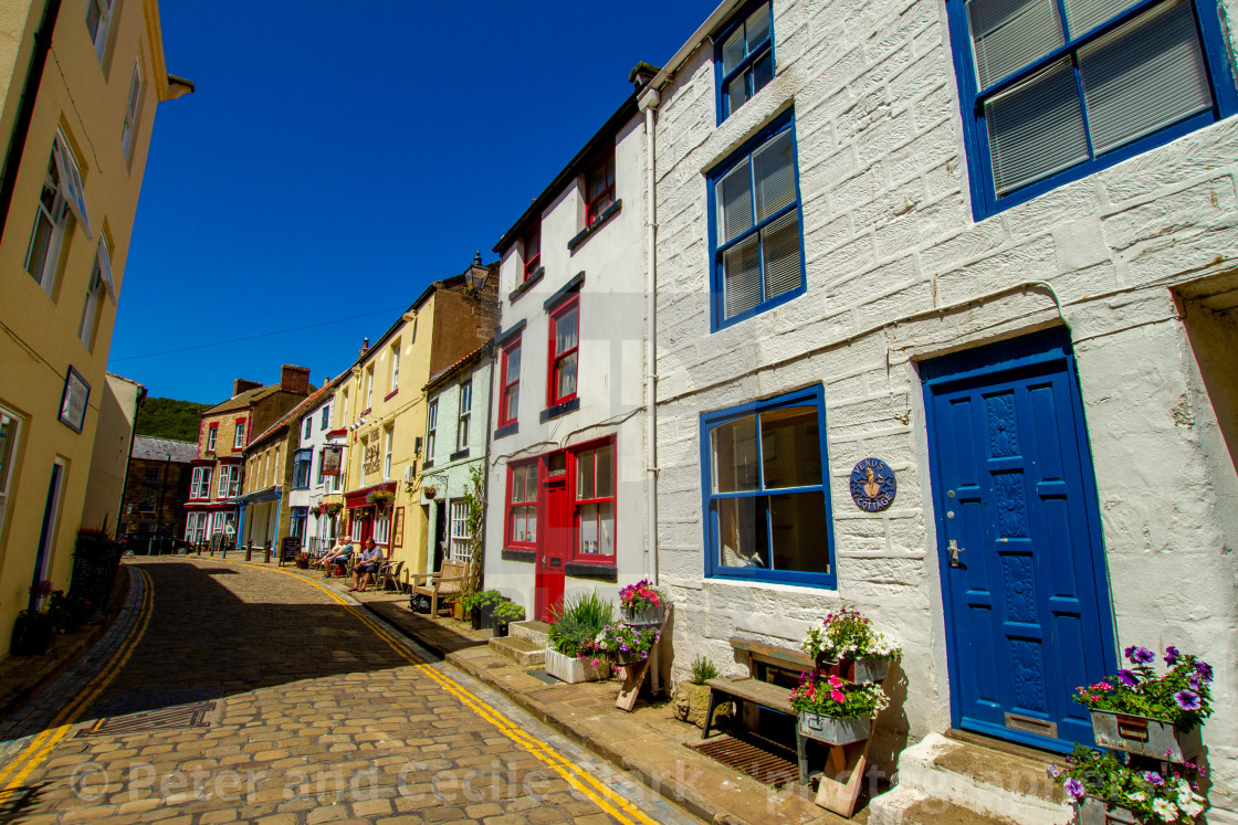 "Staithes, High Street Cottages and The Royal George Pub. Yorkshire, England." stock image