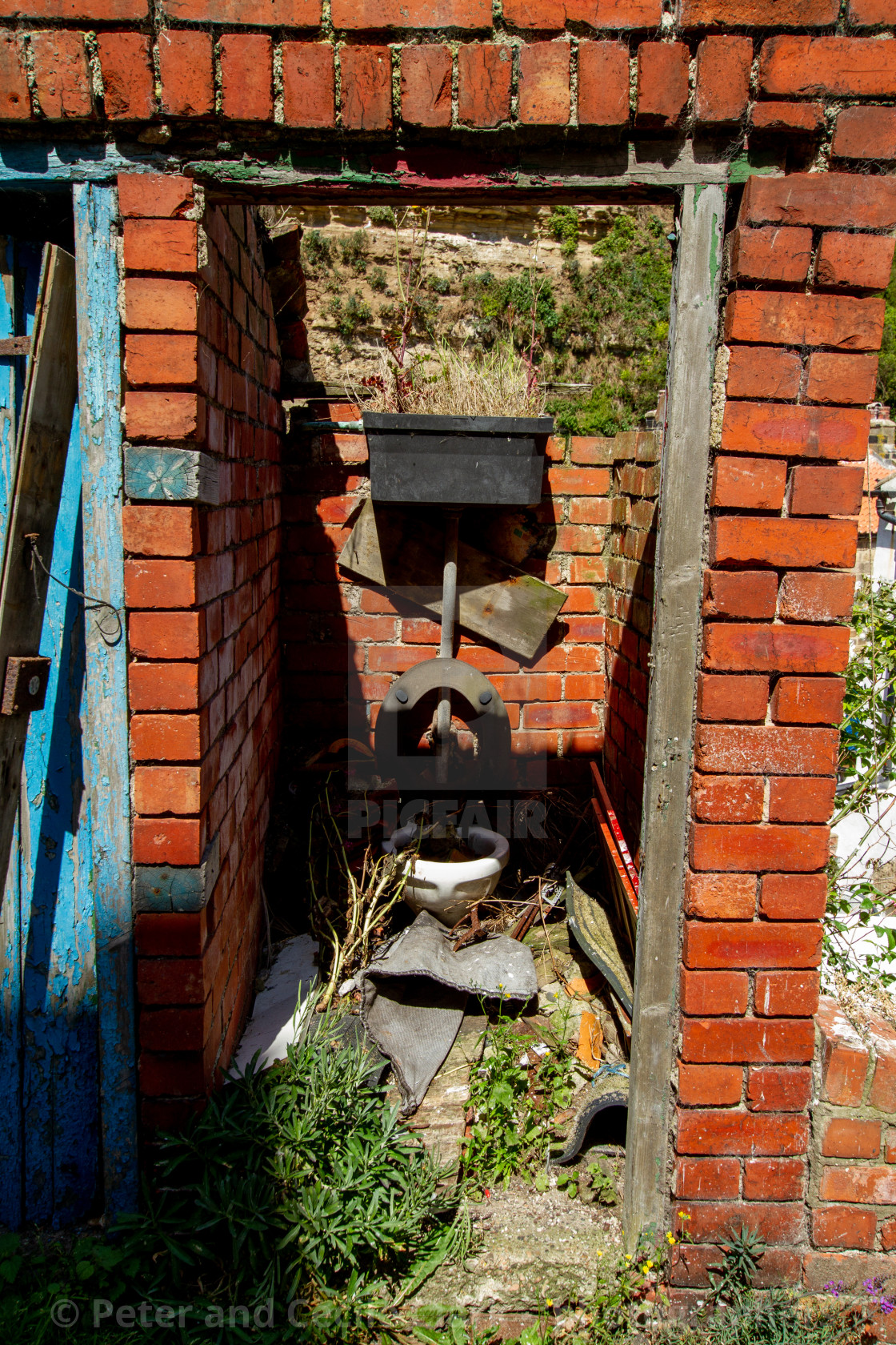 "Brick Dilapidated Outside Toilet, Staithes, Yorkshire England." stock image