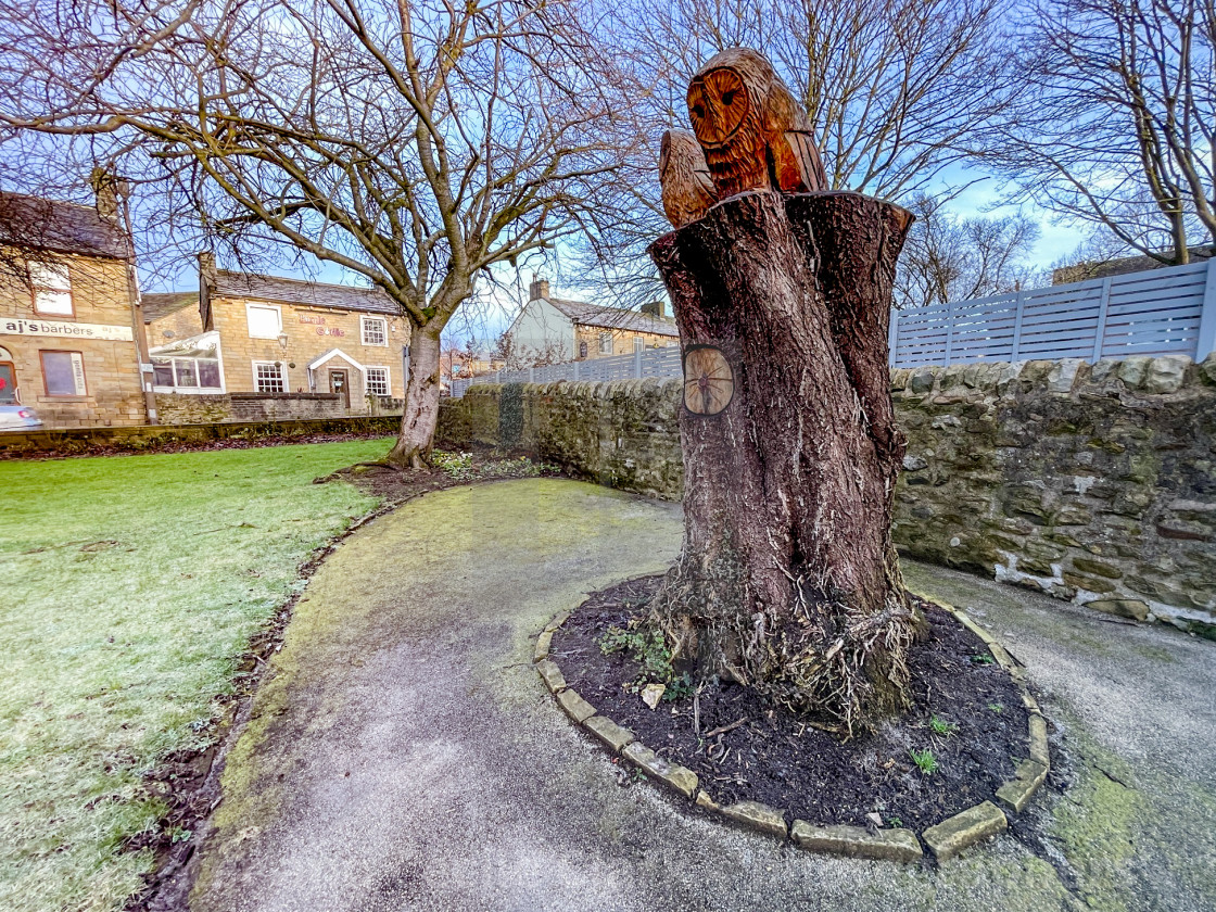 "Two Carved Owls from Tree Stump, Memorial Garden, Silsden (Cobbydale) Yorkshire, England." stock image