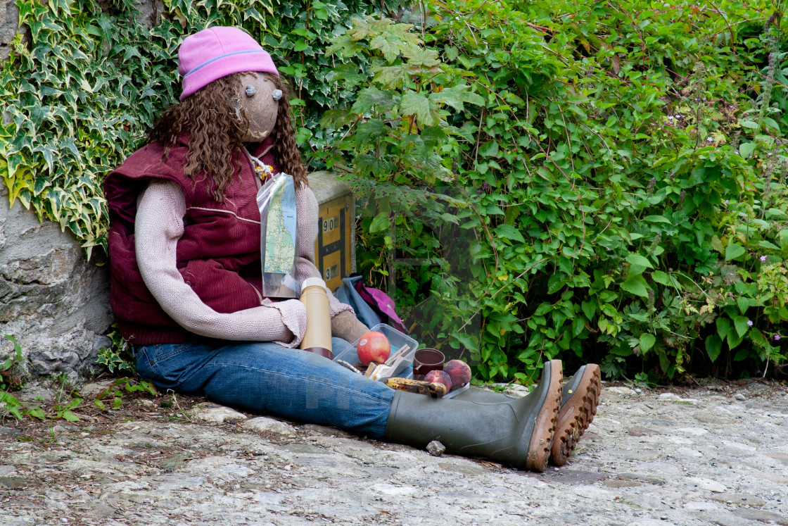 "Kettlewell Scarecrow Festival and Trail, Hiker at Lunchbreak. Yorkshire Dales, England." stock image