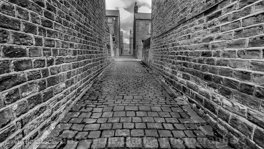 "Stone Setts in Passage. Silsden, Cobbydale, Yorkshire, England. Photographed 18th February 2021. Monochrome." stock image