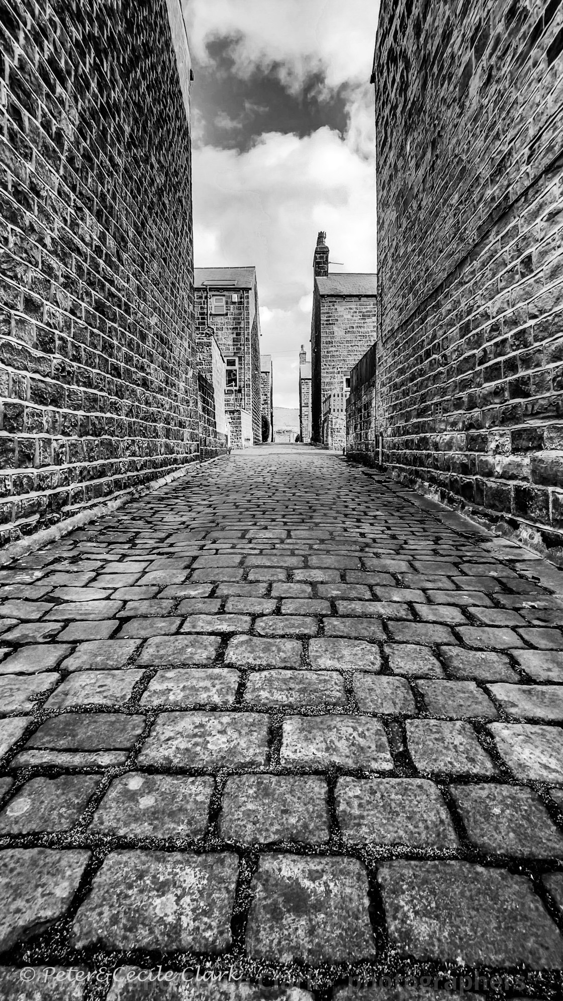 "Stone Setts in Passage. Silsden, Cobbydale, Yorkshire, England. Photographed 18th February 2021. Monochrome." stock image