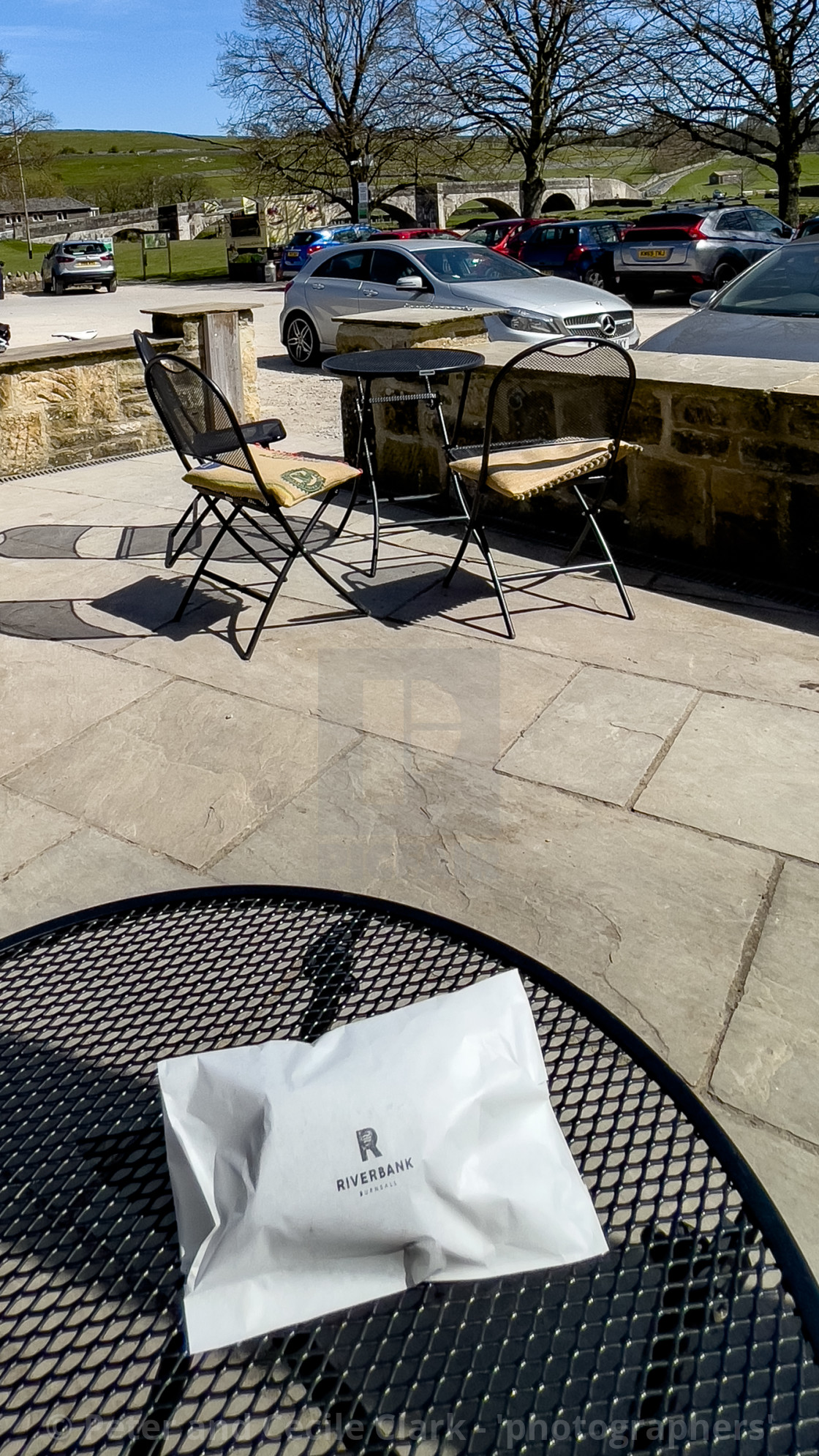 "Outside Table and Chairs, at Riverbank, Coffee shop, Burnsall, Yorkshire Dales, England." stock image