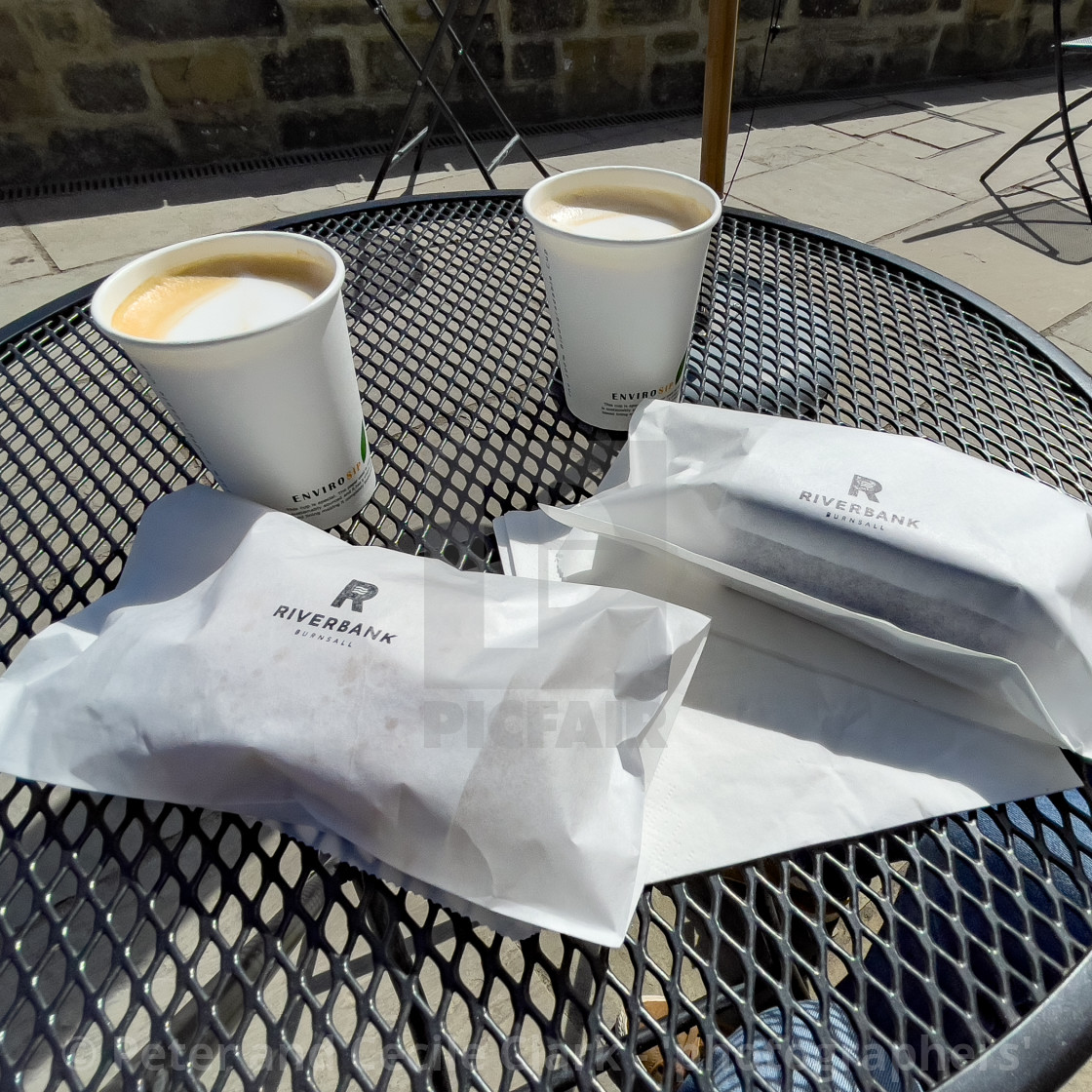 "Sausage Rolls, packaged, with Coffee at Riverbank, Coffee Shop, Burnsall, Yorkshire Dales." stock image