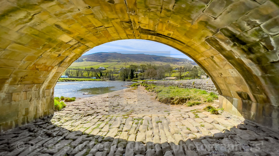 "View through Burnsall Bridge Flood Arch. Burnsall, Yorkshire." stock image