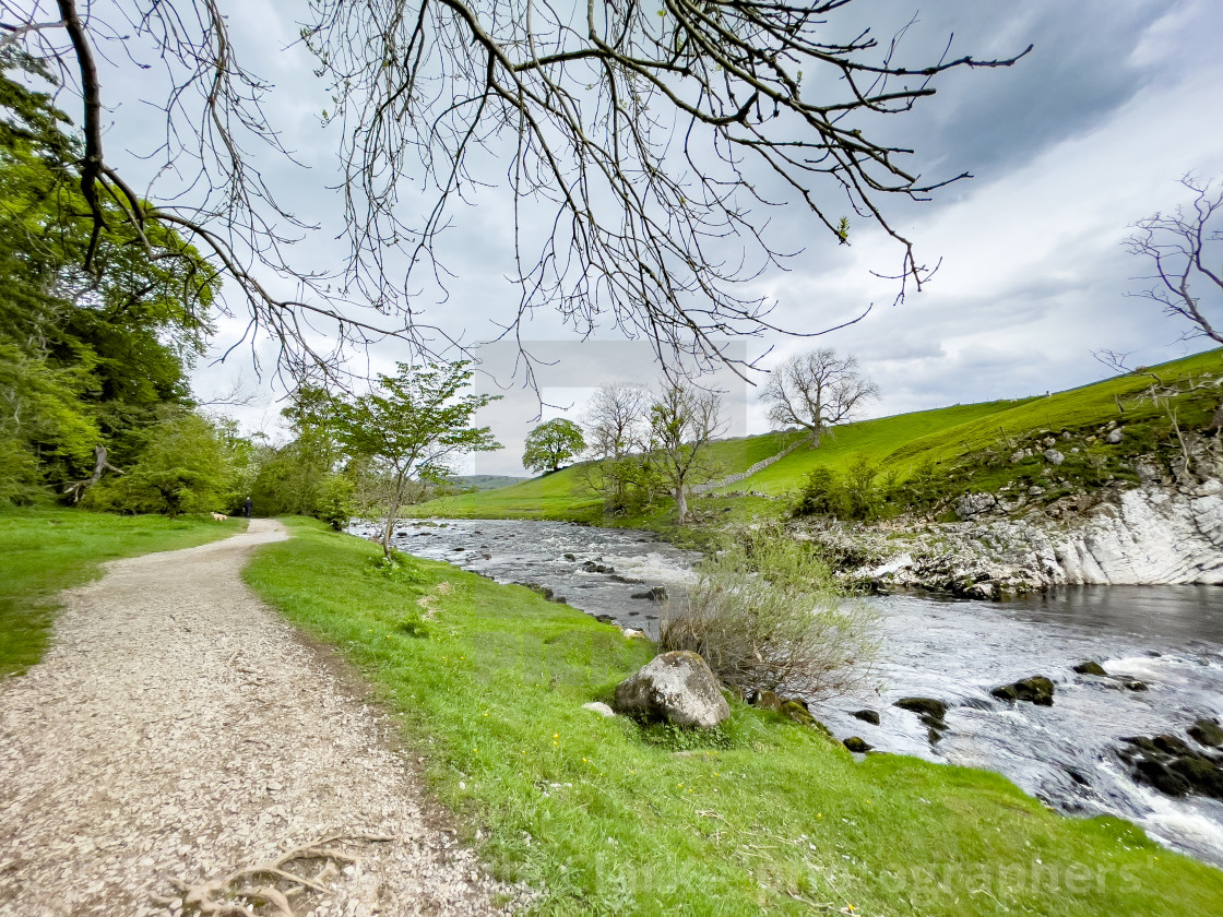 "Dalesway Footpath near River Wharfe at Loup Scar near Burnsall in the Yorkshire Dales." stock image