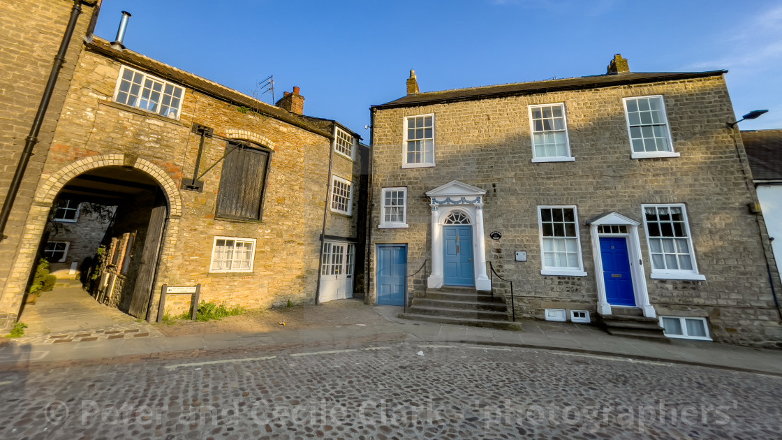 "Newbiggin, Cobbled Street, Richmond, Yorkshire." stock image