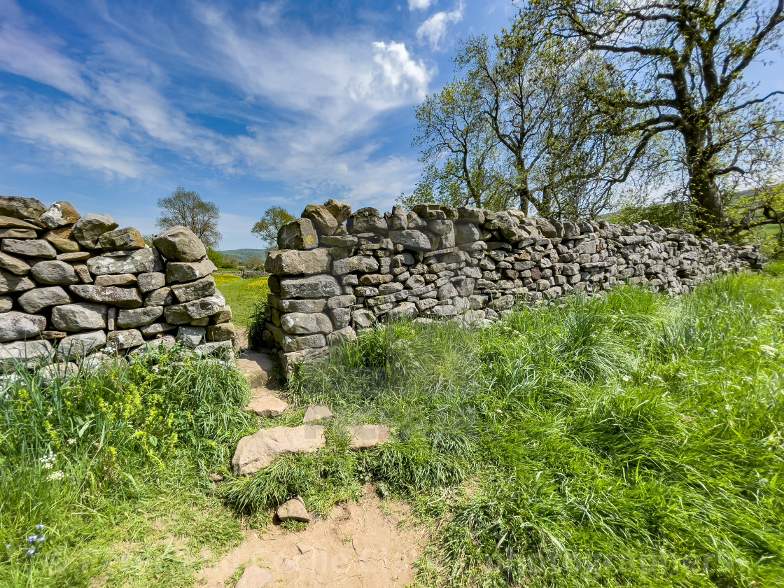 "Public Footpath Stile in Dry Stone Wall, Reeth, Swaledale." stock image