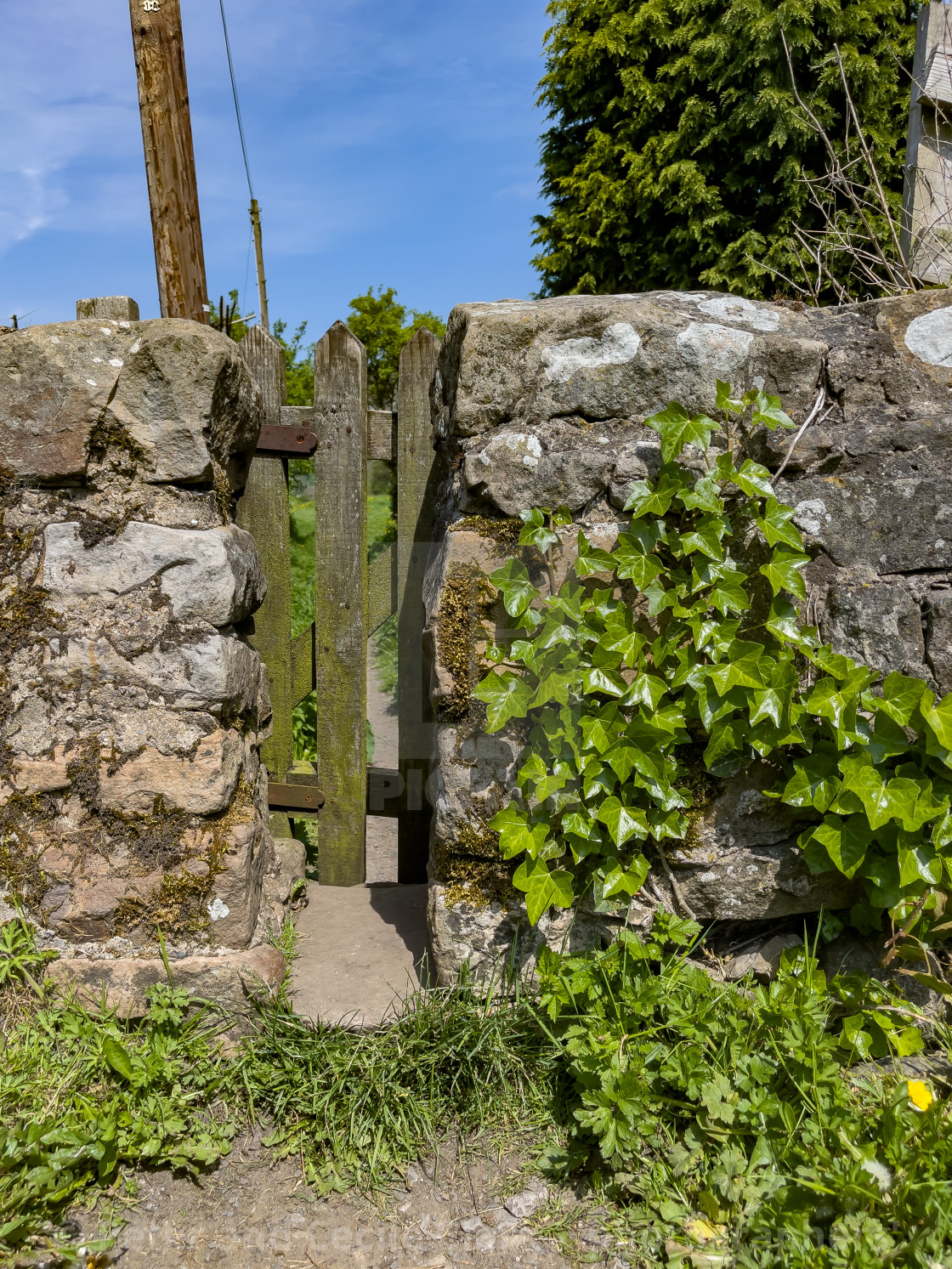 "Public Footpath Stile in Stone Wall, Reeth, Swaledale." stock image