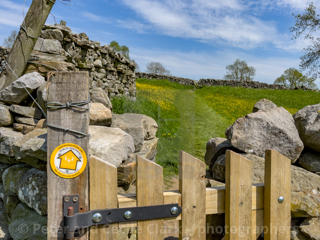 "Public Footpath Stile with Gate in Dry Stone Wall, Reeth, Swaledale." stock image