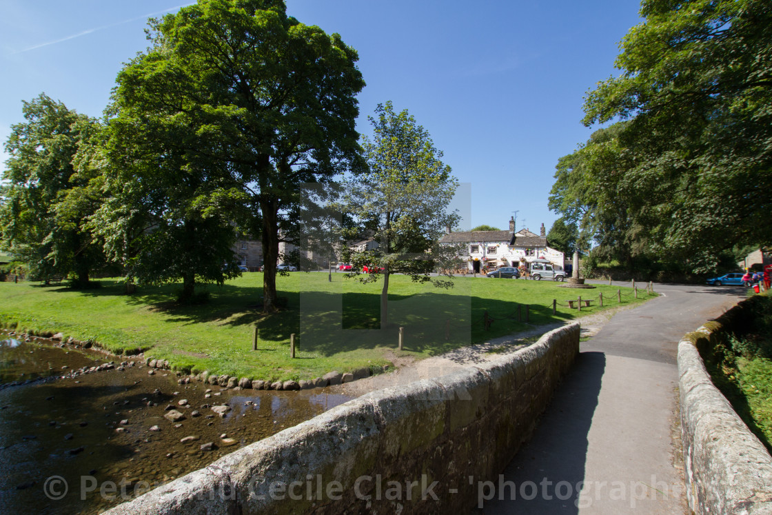 "Packhorse Bridge over Linton Beck, Linton in Craven, Yorkshire Dales." stock image