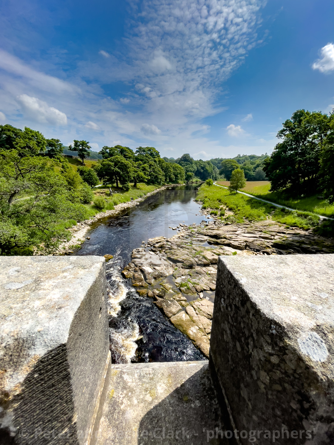 "Crenelated Nidd Aquaduct crossing River Wharfe near Barden Bridge." stock image