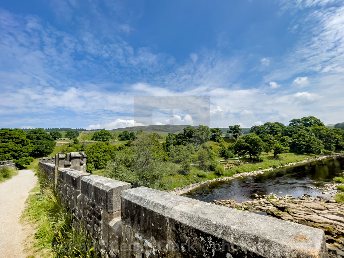 "Crenelated Nidd Aquaduct crossing River Wharfe near Barden Bridge." stock image