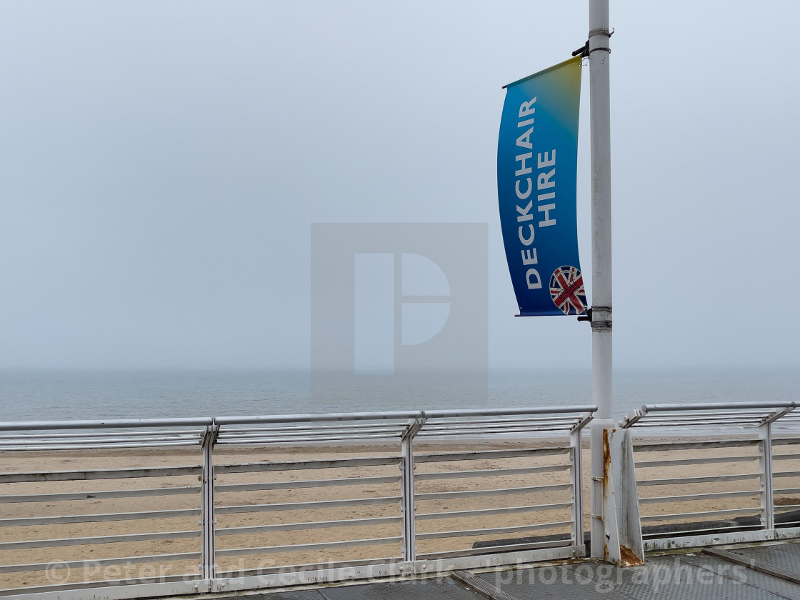"Deckchair Hire Flag" by Peter and Cecile Clark - 'photographers' - $25.25 "Deckchair Hire Flag" stock image
