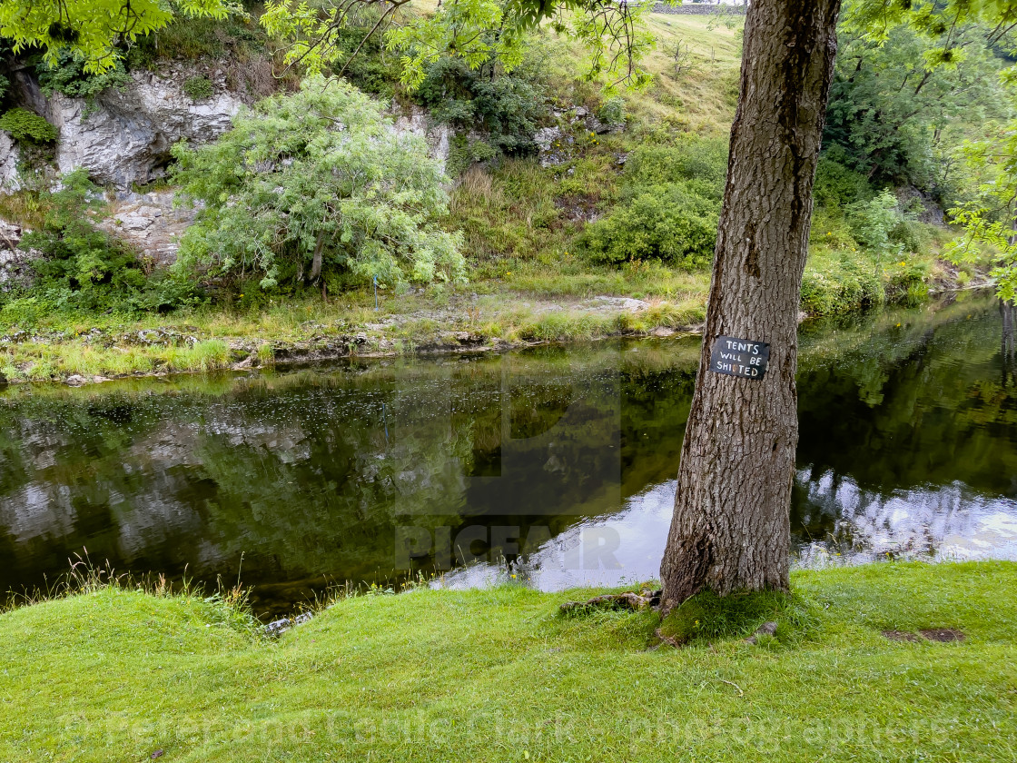 "'Tents Will Be Shifted' Warning Sign" by Peter and Cecile Clark - 'photographers' - $25.35 "'Tents Will Be Shifted' Warning Sign" stock image