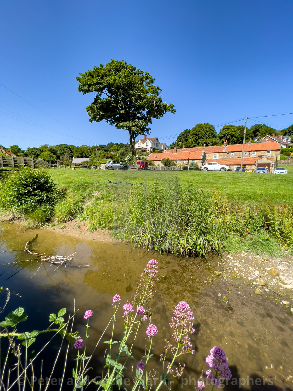 "Sandsend Beck and Cottages." stock image