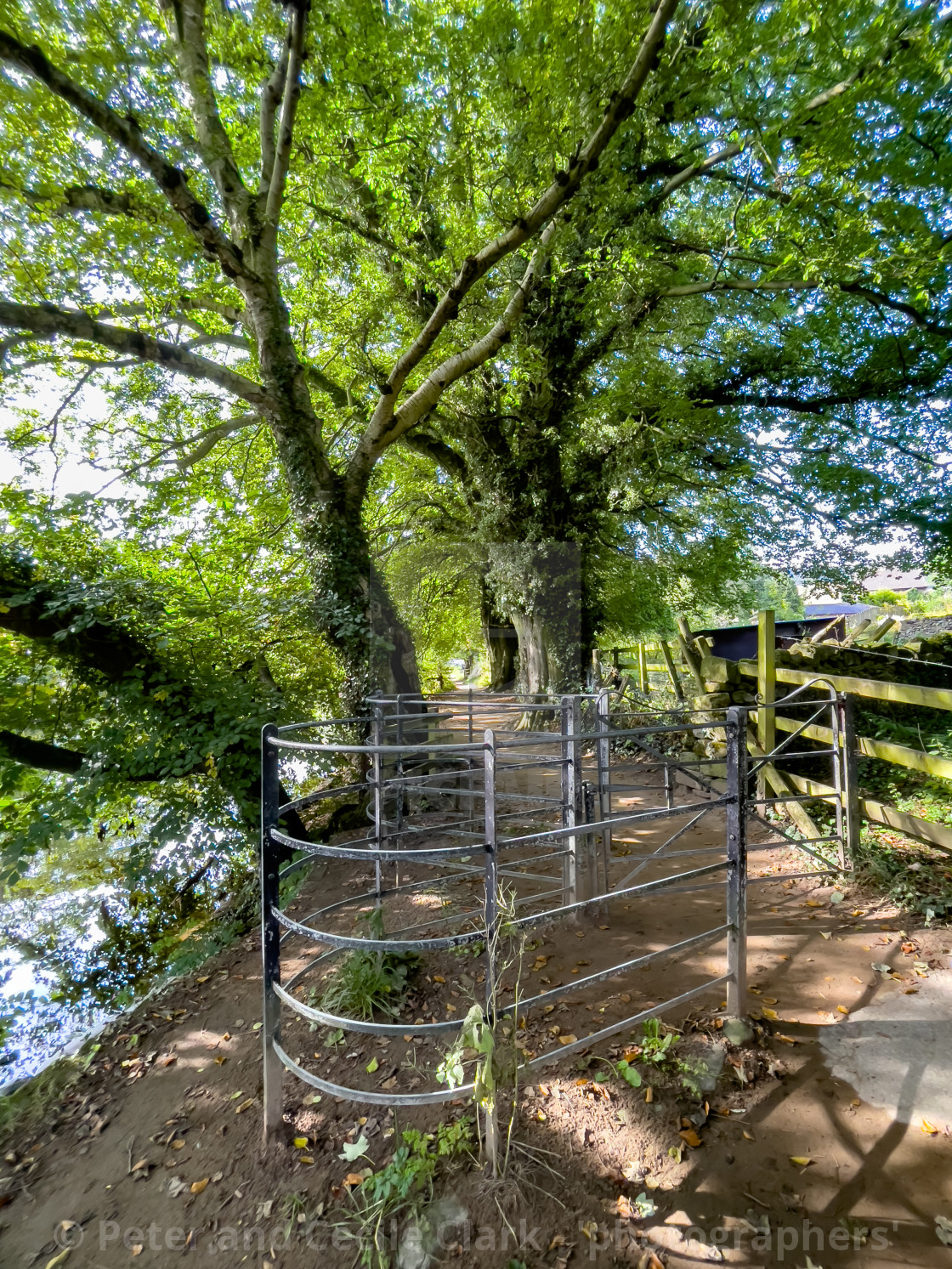 "Kissing Gate, Burnsall." by Peter and Cecile Clark - 'photographers' - $25.17 "Kissing Gate, Burnsall." stock image
