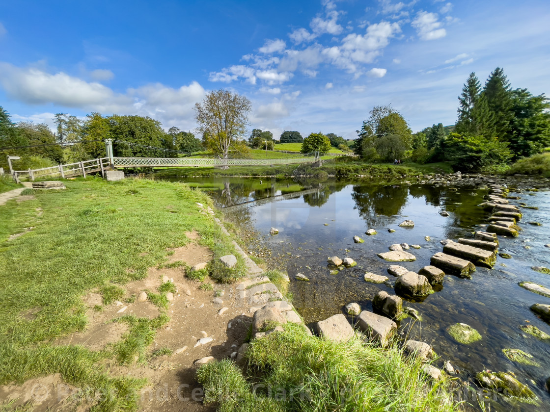 "Hebden Suspension Bridge and Stepping Stones." stock image